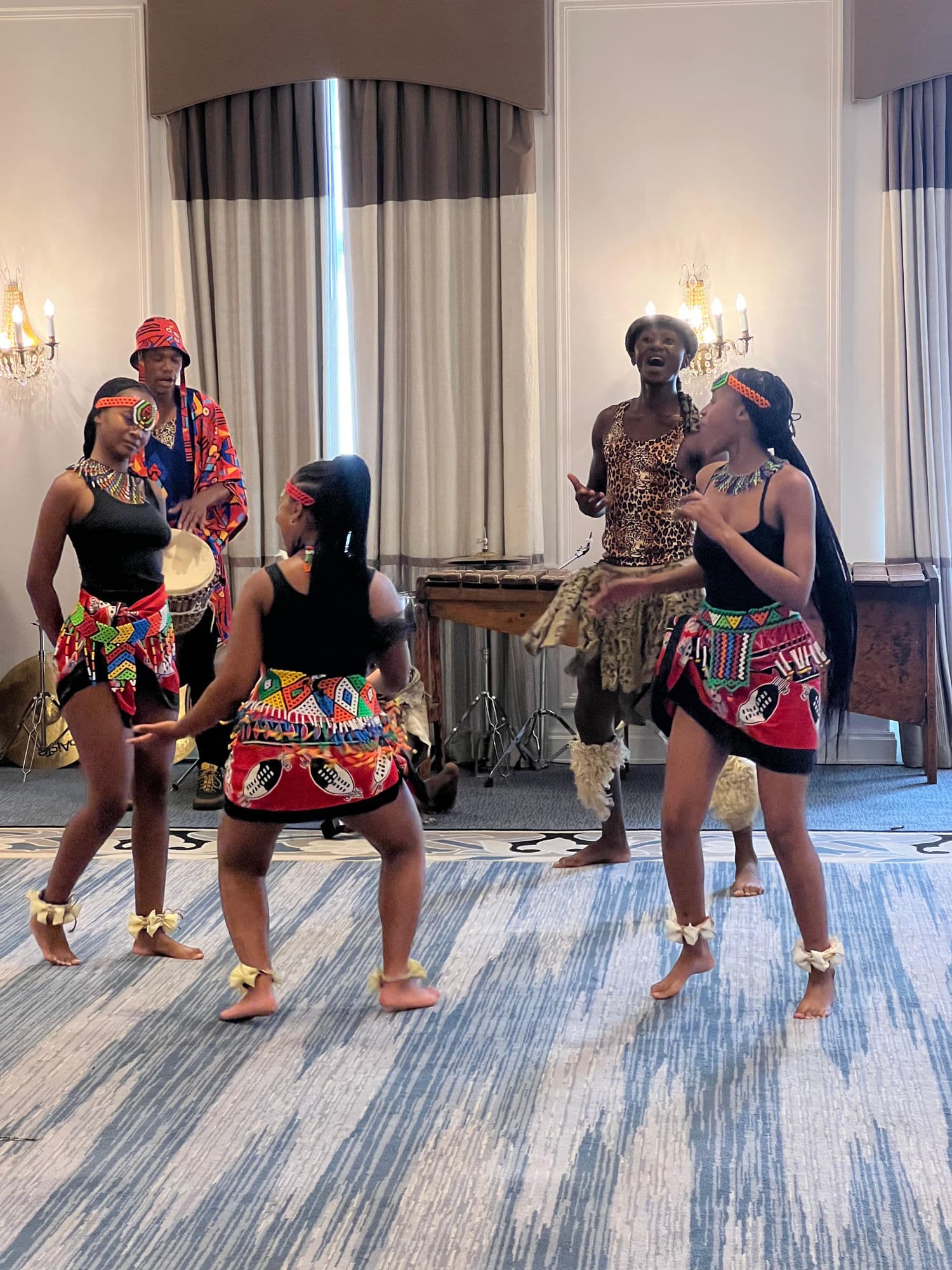 Traditional African dancers performing at a corporate function